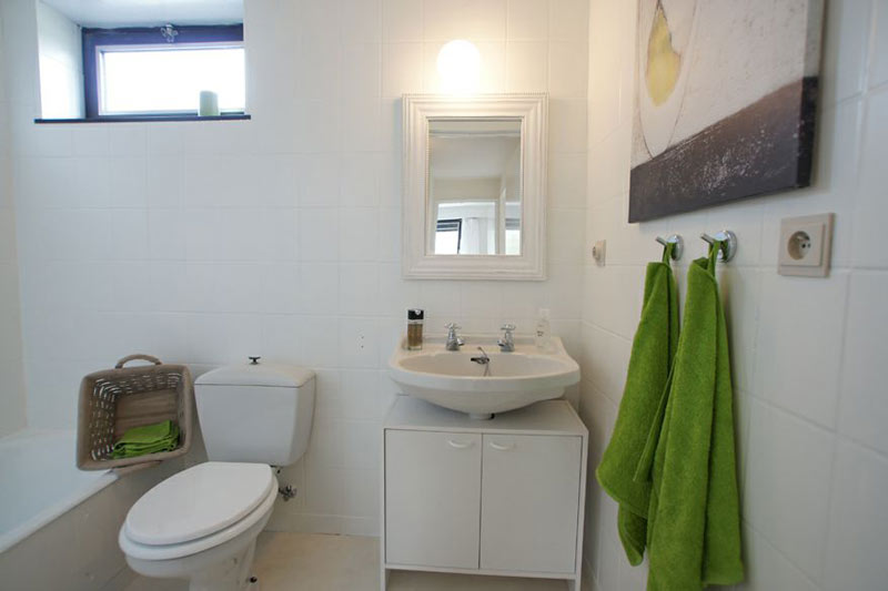 De badkamer NA